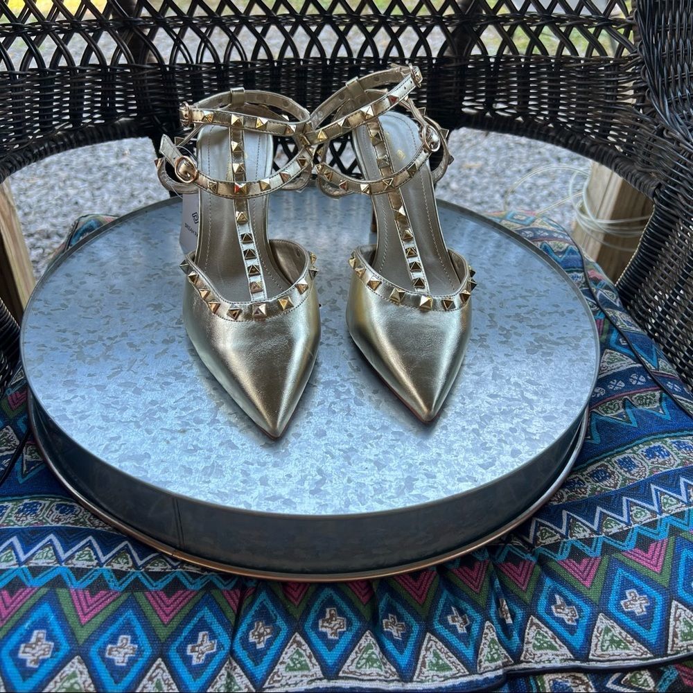 Gold spike heels